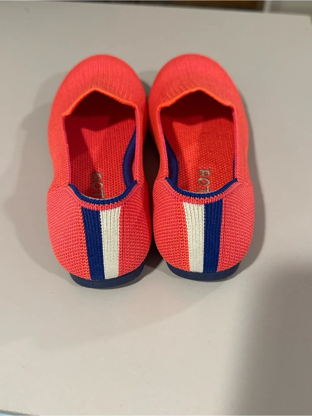 Rothy's Kids Coral-Pink Knit Slip-On Flats with Navy Trim